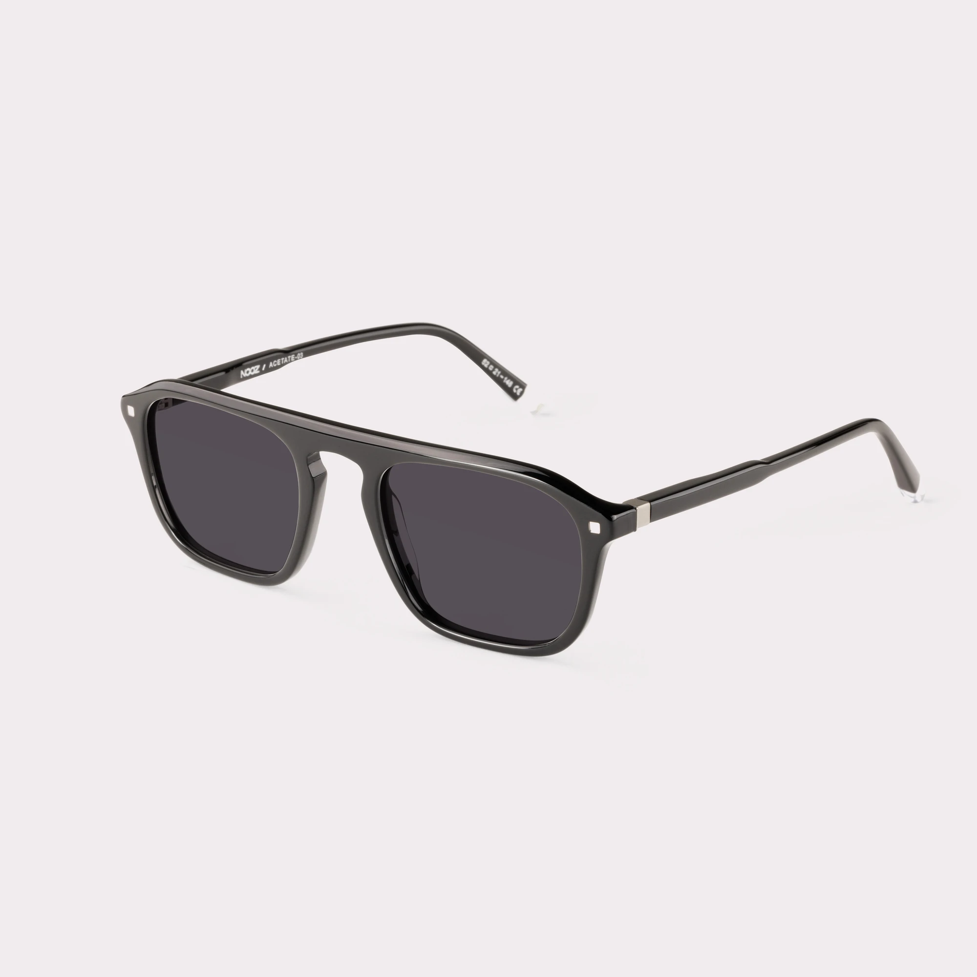 A pair of Captain Black Sunglasses  seen from the side