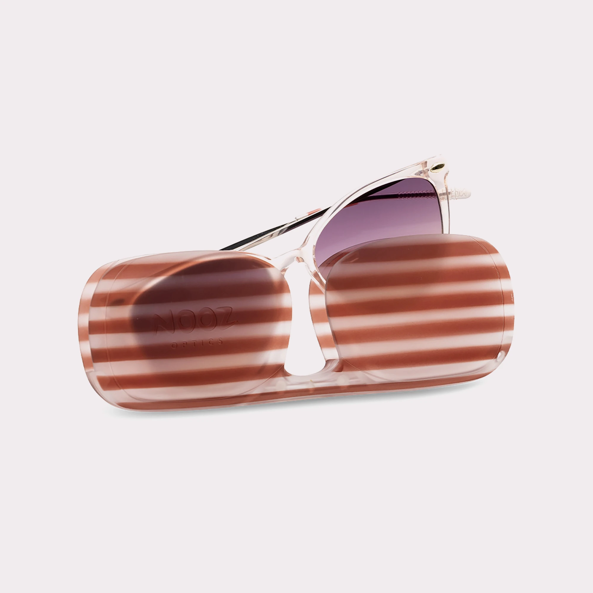 A pair of Ivy Demi-Red Sunglasses coming out of its case