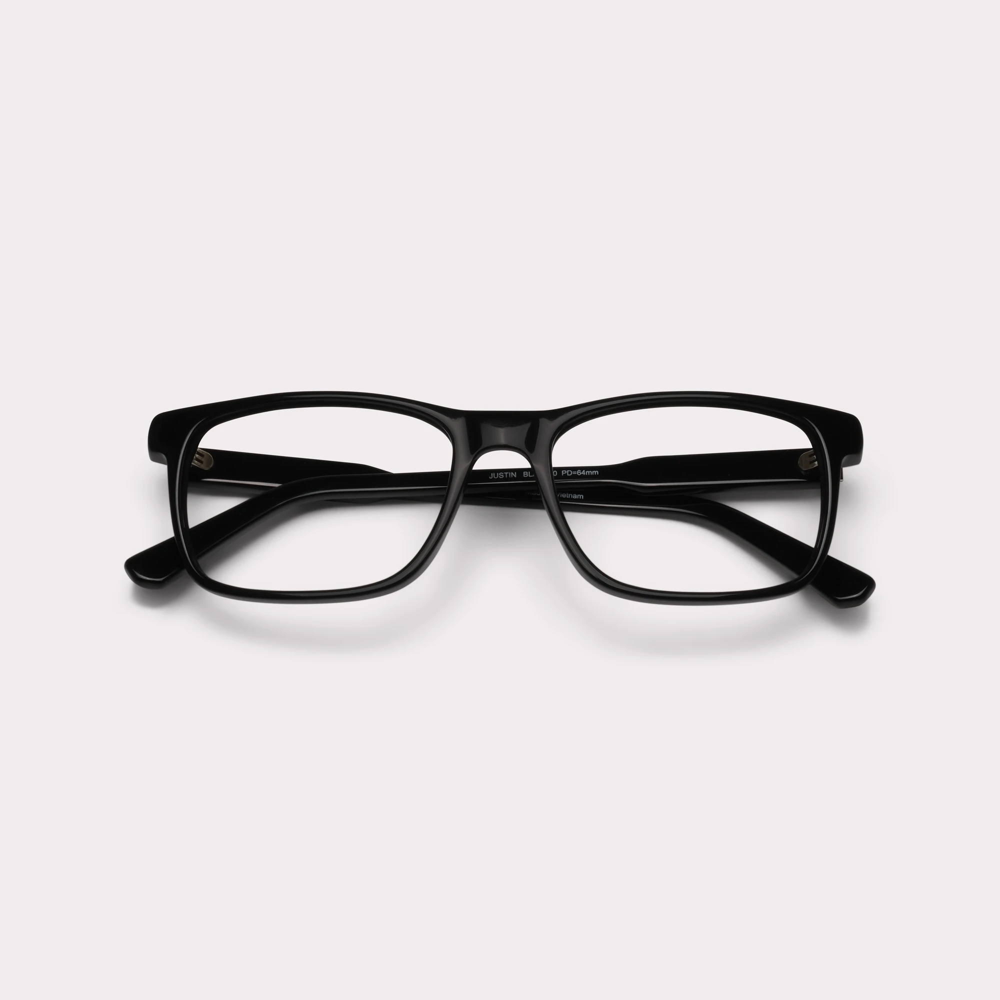 Ein Paar Justin Schwarz Multidistanz™-Lesebrille mit Blaulichtfilter , zusammengeklappt
