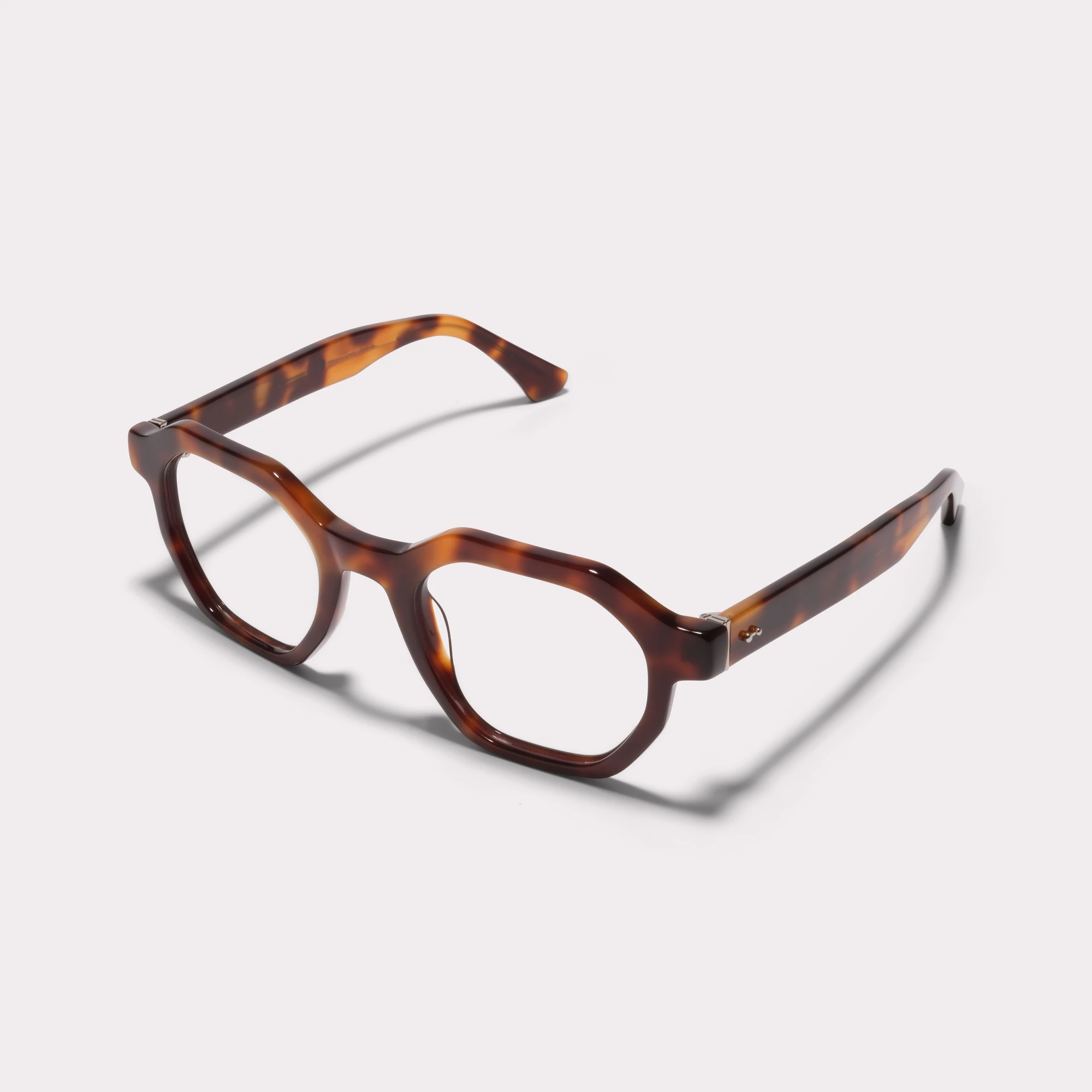 A pair of Miller Tortoise Reading glasses  seen from the side