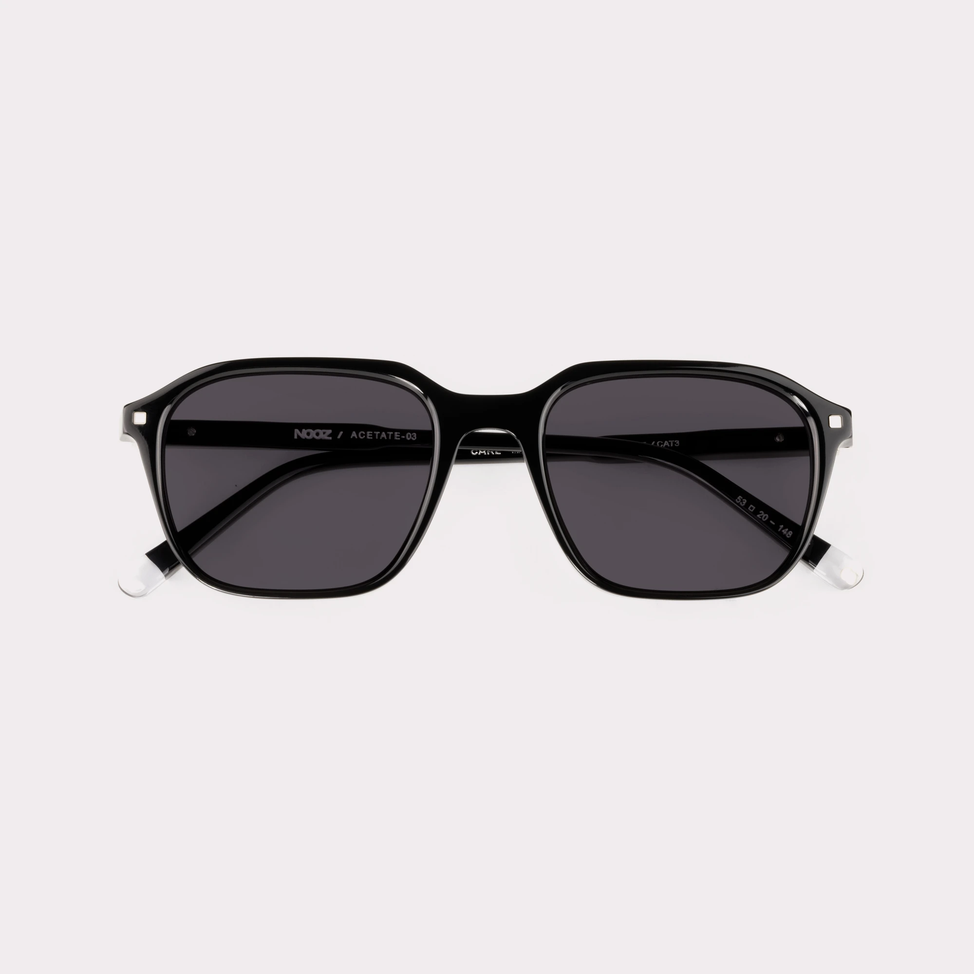 A pair of Carl Black Sunglasses folded
