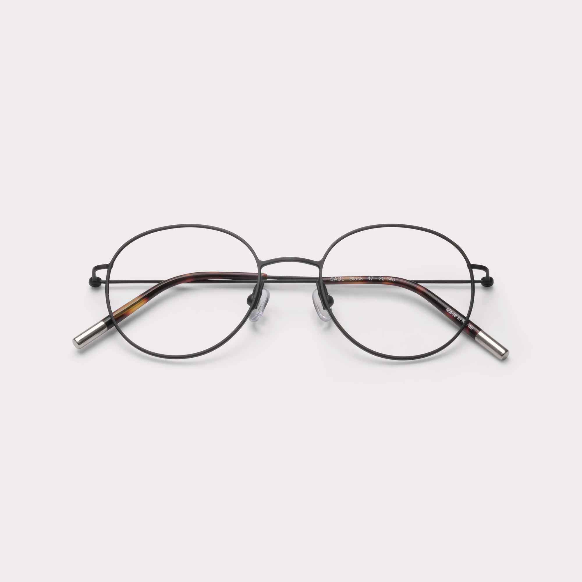 A pair of Saul Black Multi-distance™ blue light blocking reading glasses folded
