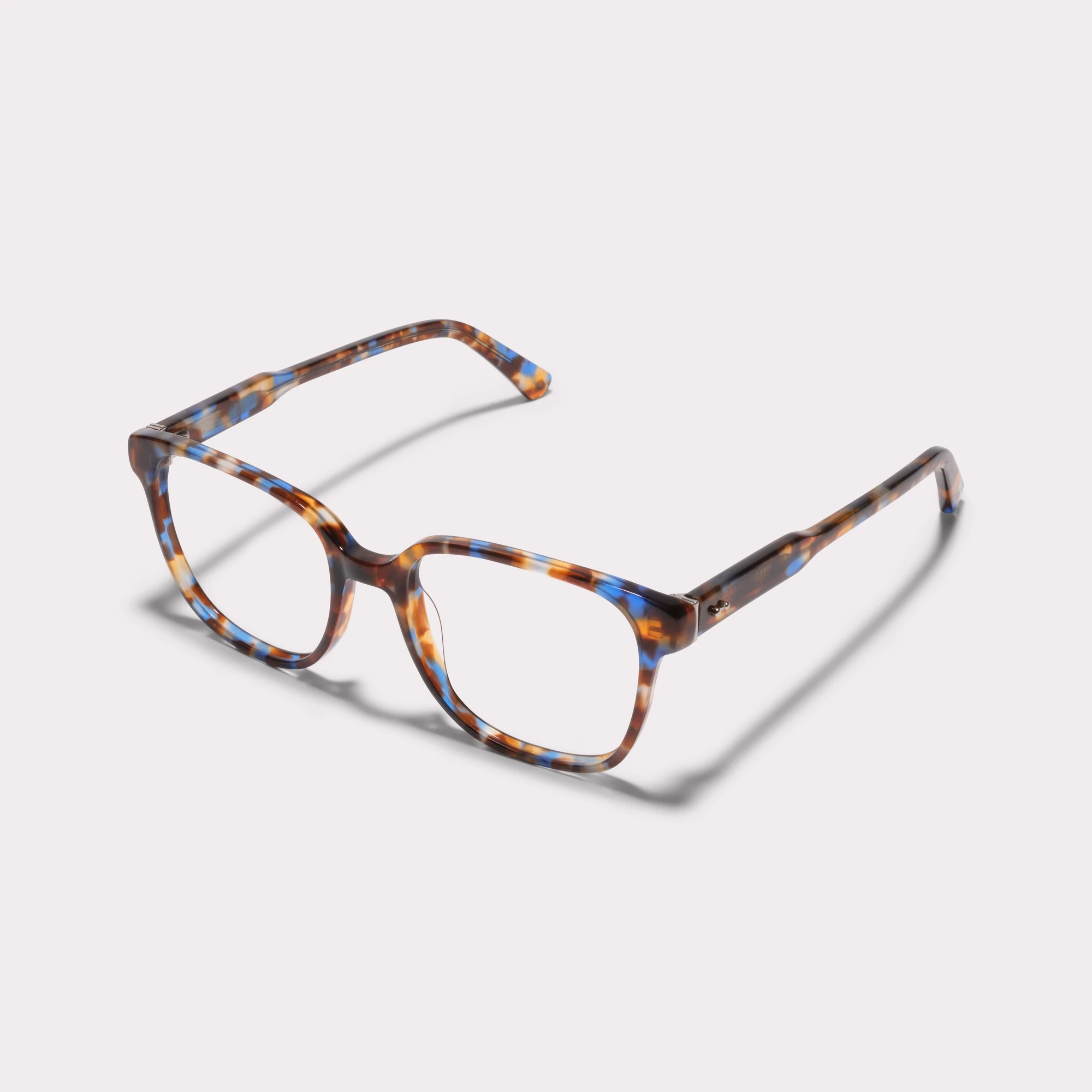 A pair of Clara Blue tortoise Multi-distance™ blue light blocking reading glasses seen from the side