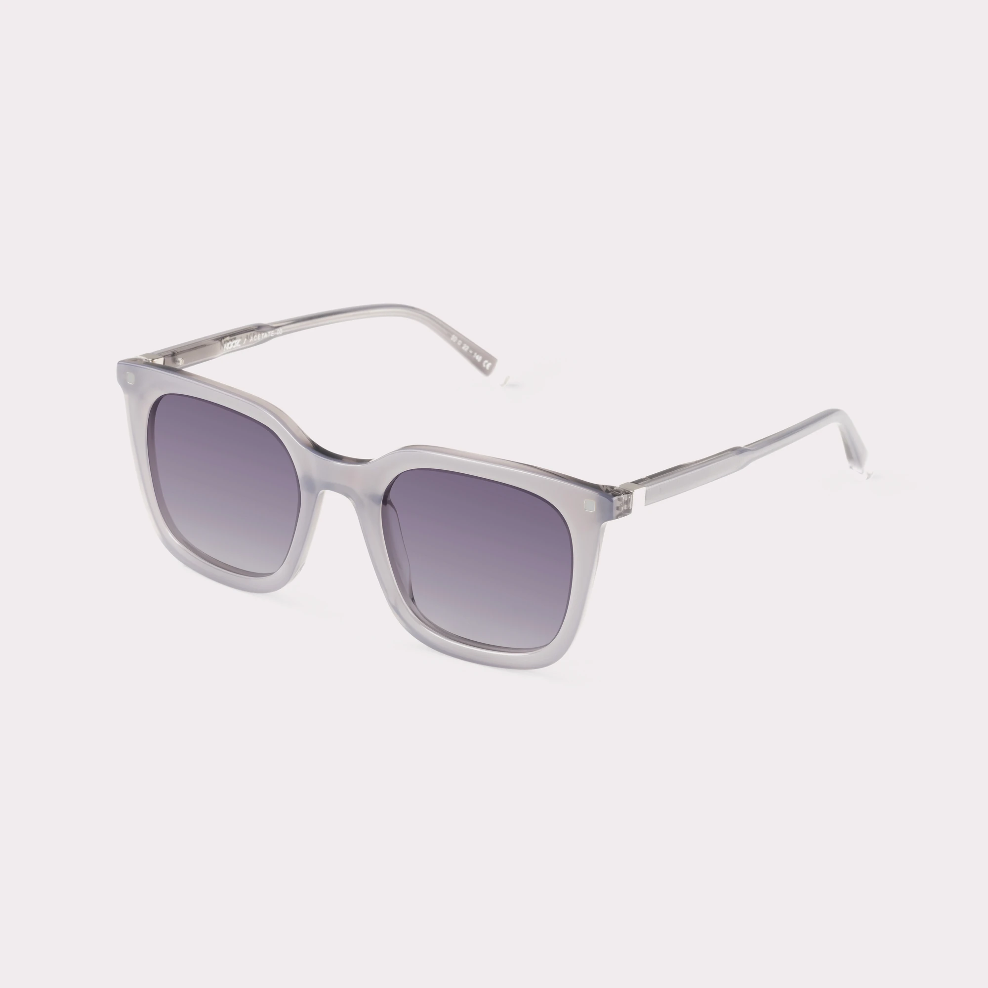 A pair of Candid Light grey Sunglasses  seen from the side