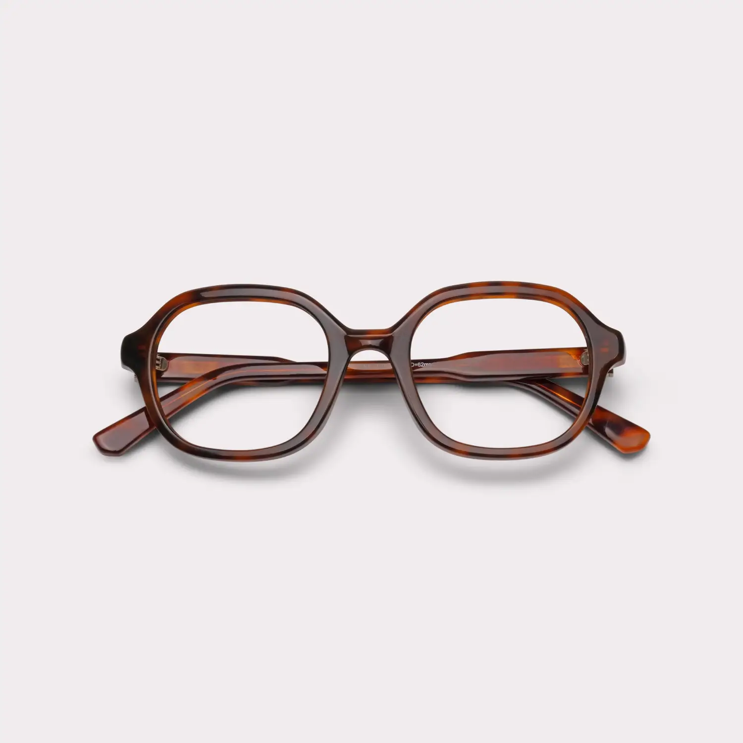A pair of Lana Tortoise Reading glasses folded