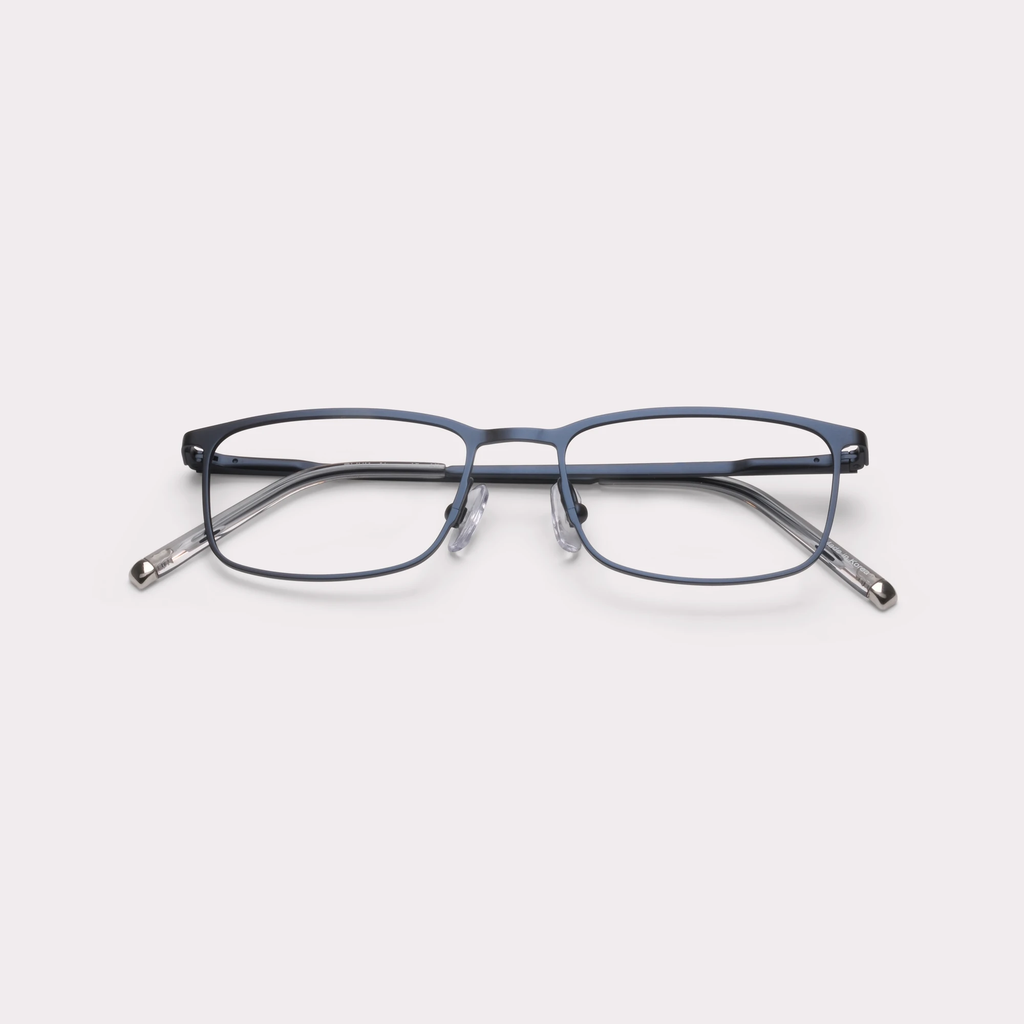 A pair of Ross Navy Prescription glasses folded