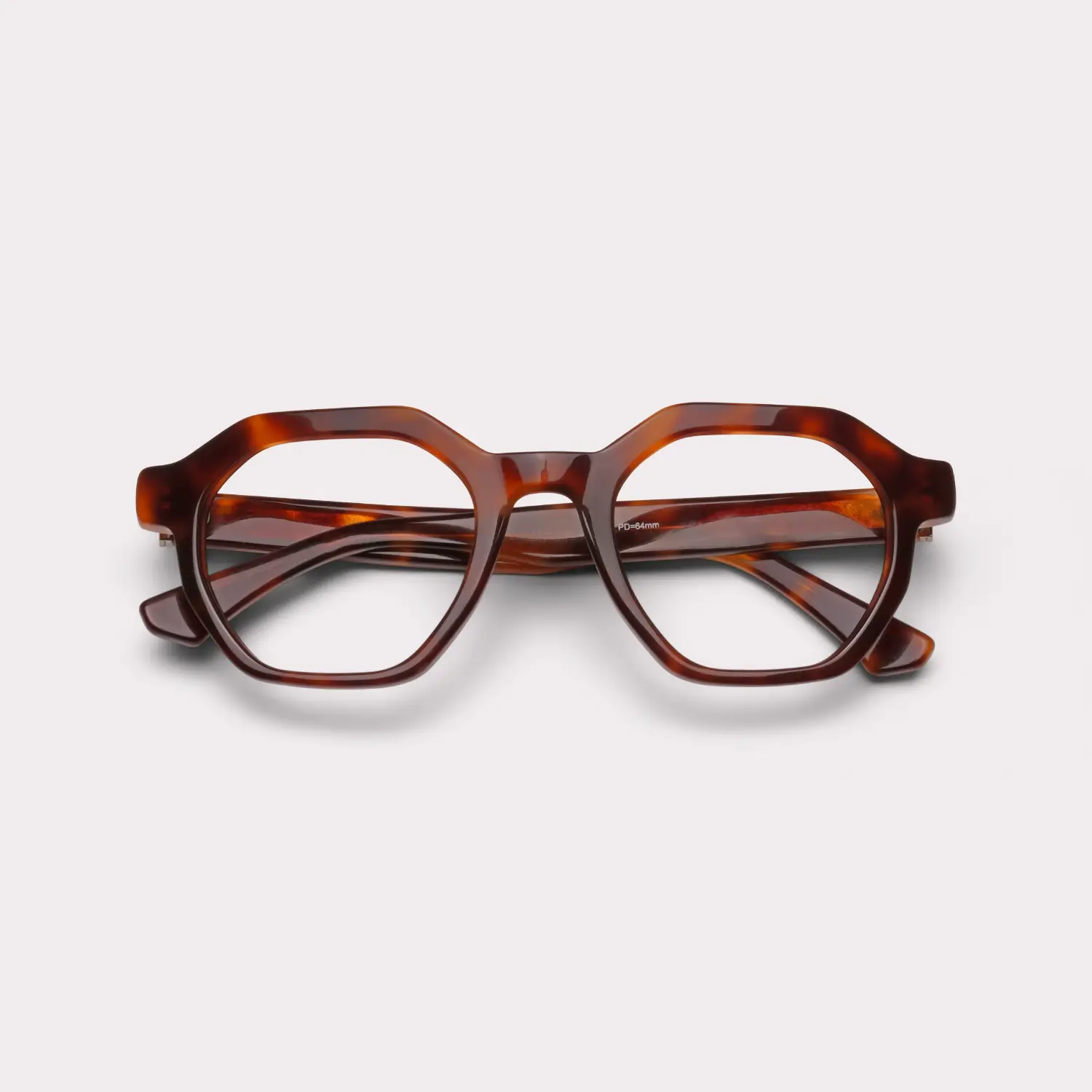 A pair of Miller Tortoise Reading glasses folded