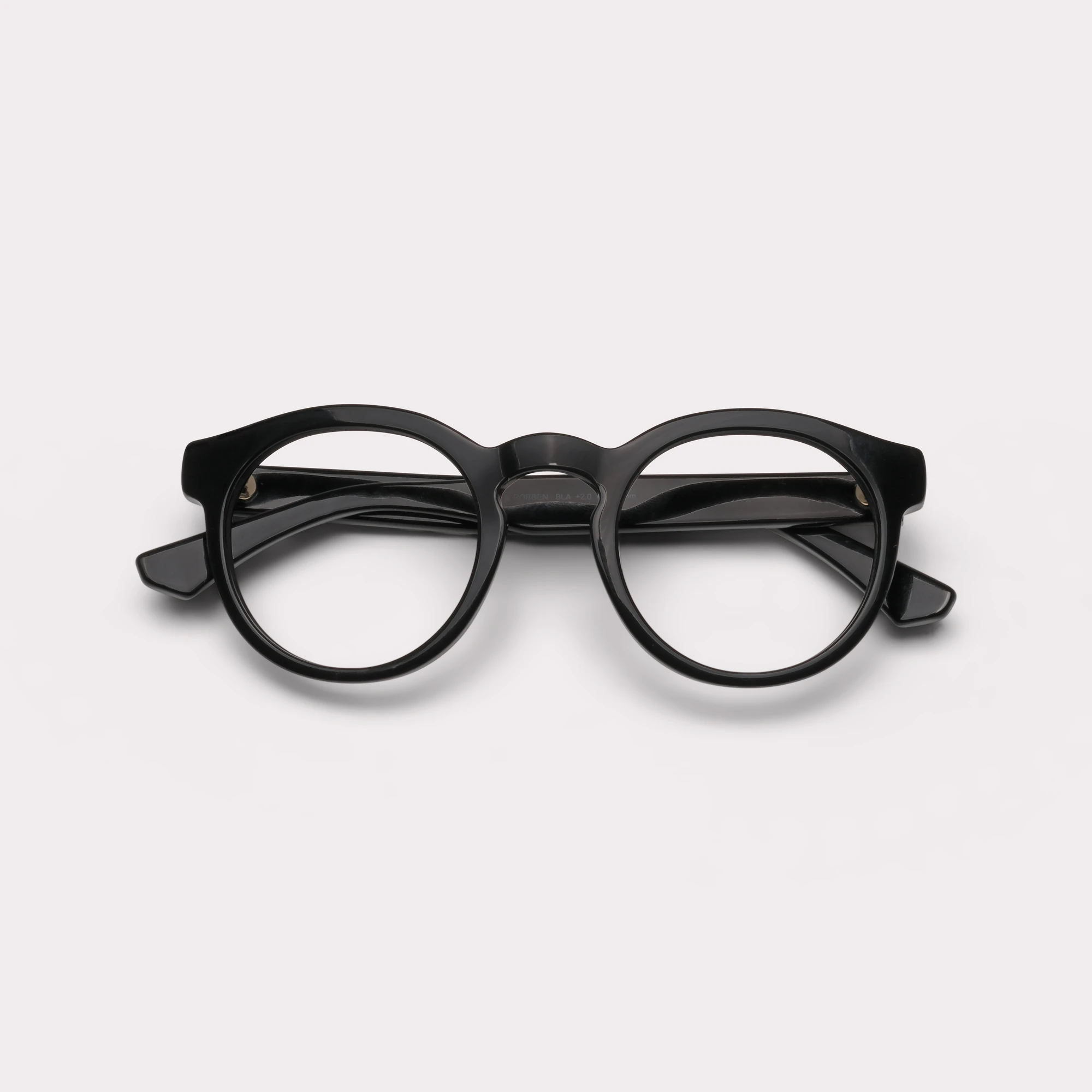 A pair of Robben Black Reading glasses folded