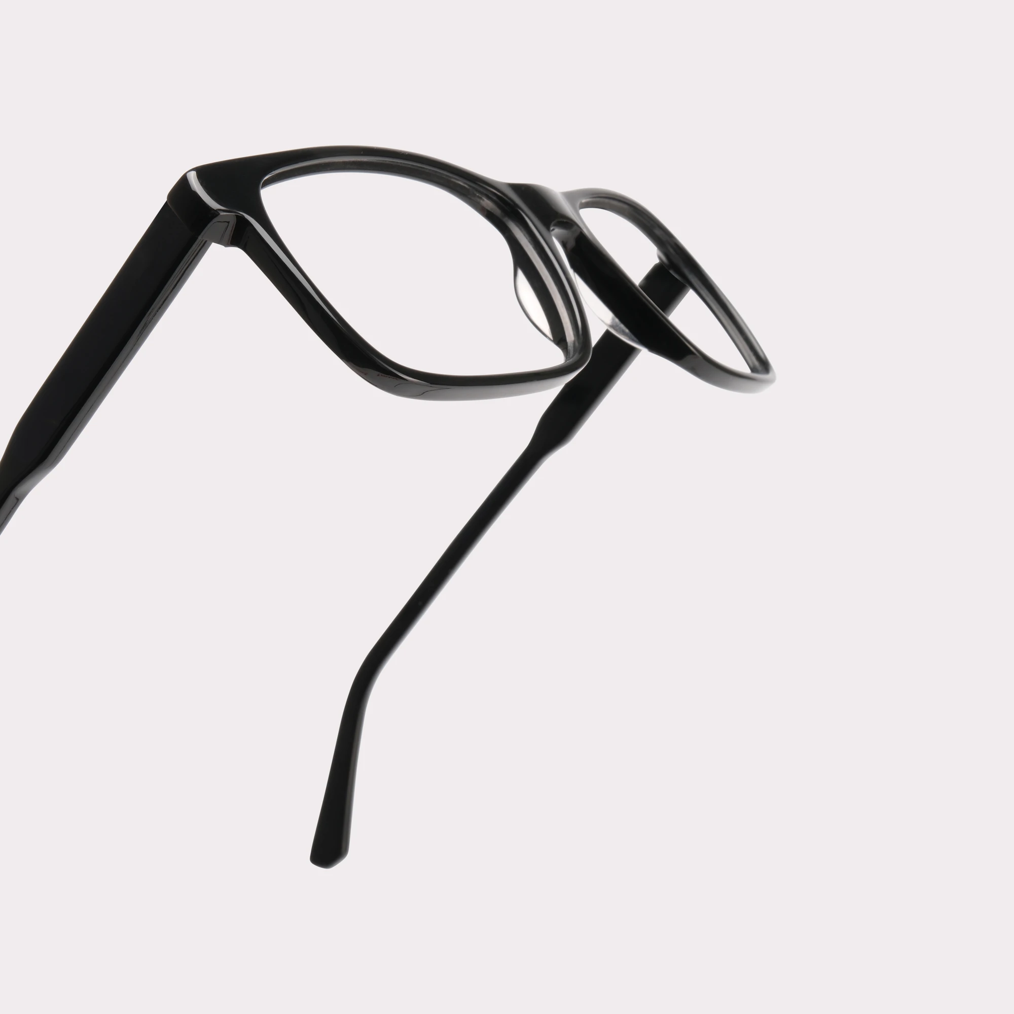 A pair of Justin Black Reading glasses in a macro view
