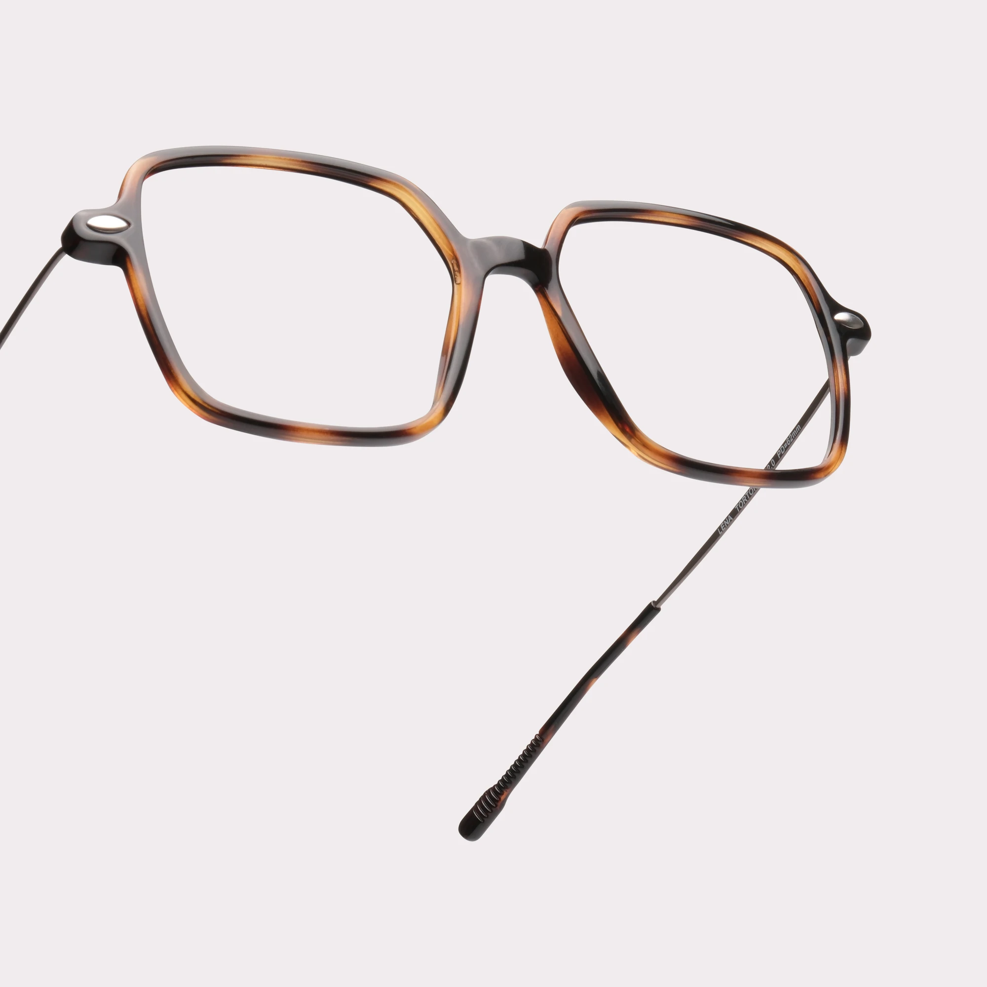 A pair of Lena Tortoise Reading glasses in a macro view