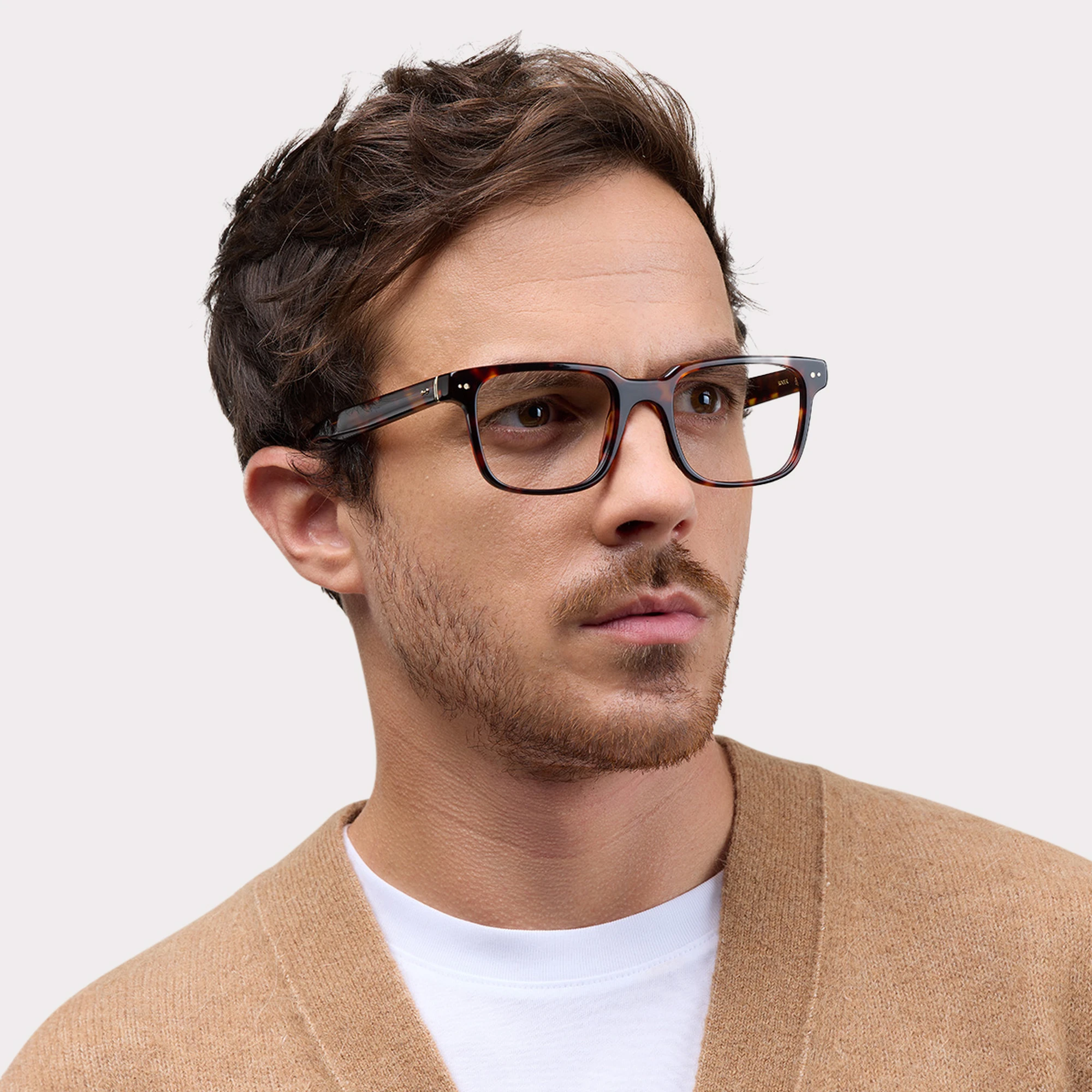 A pair of Roger Tortoise Prescription glasses