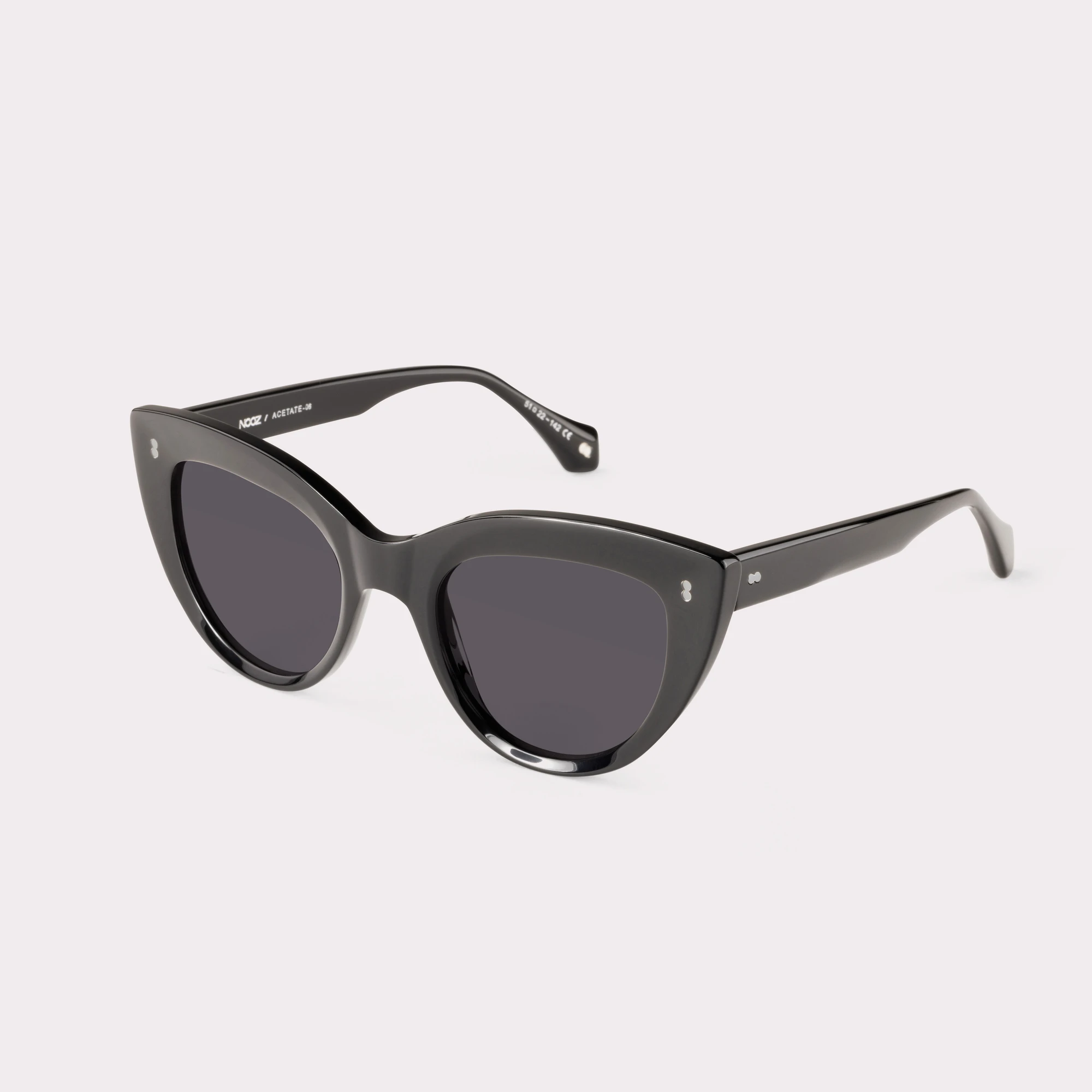 A pair of Romy Black Sunglasses  seen from the side