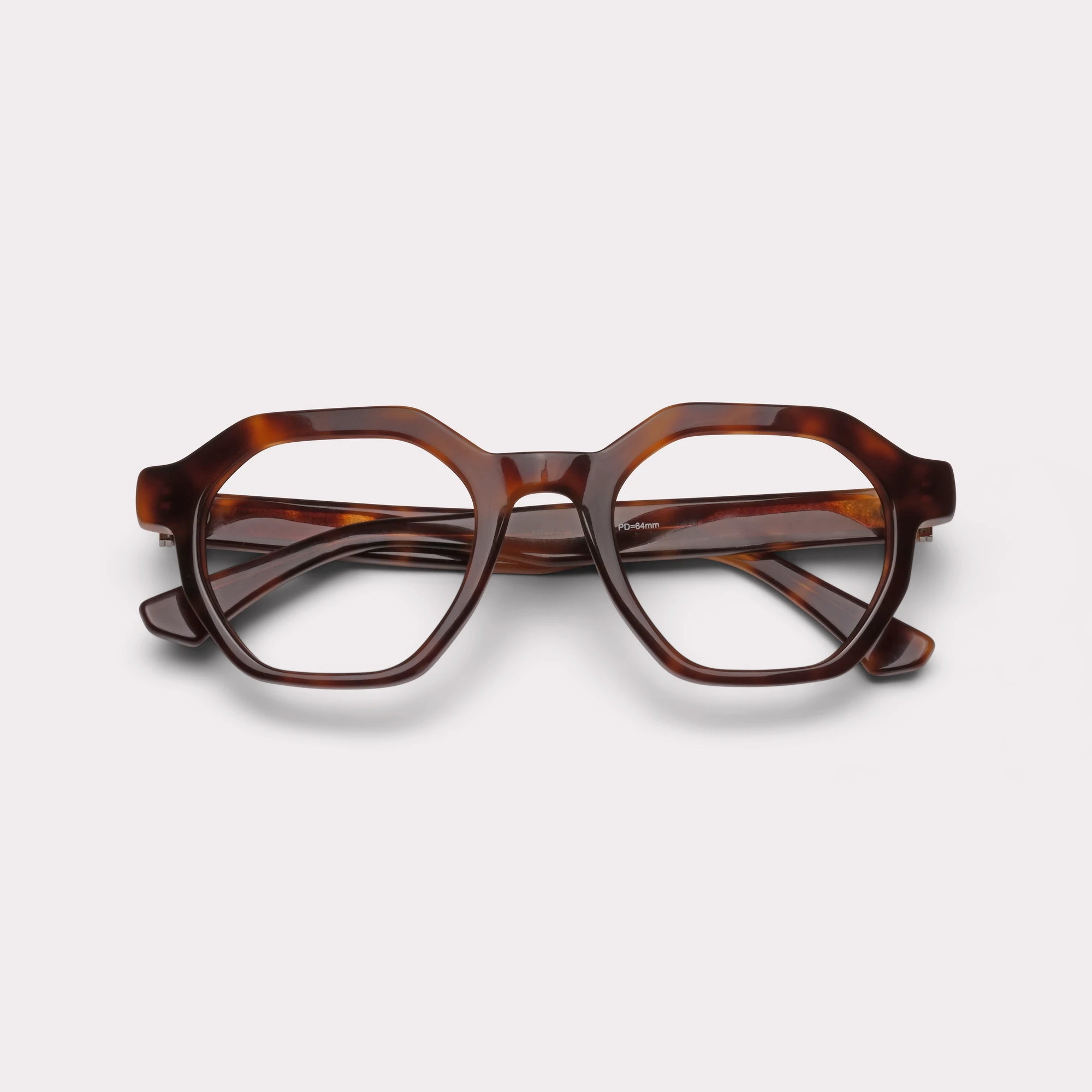 A pair of Miller Tortoise Reading glasses folded