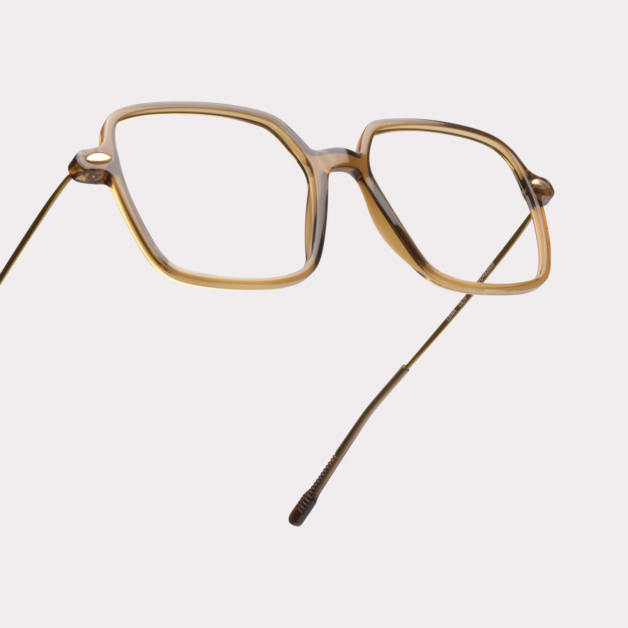 A pair of Lena Olive Reading glasses in a macro view