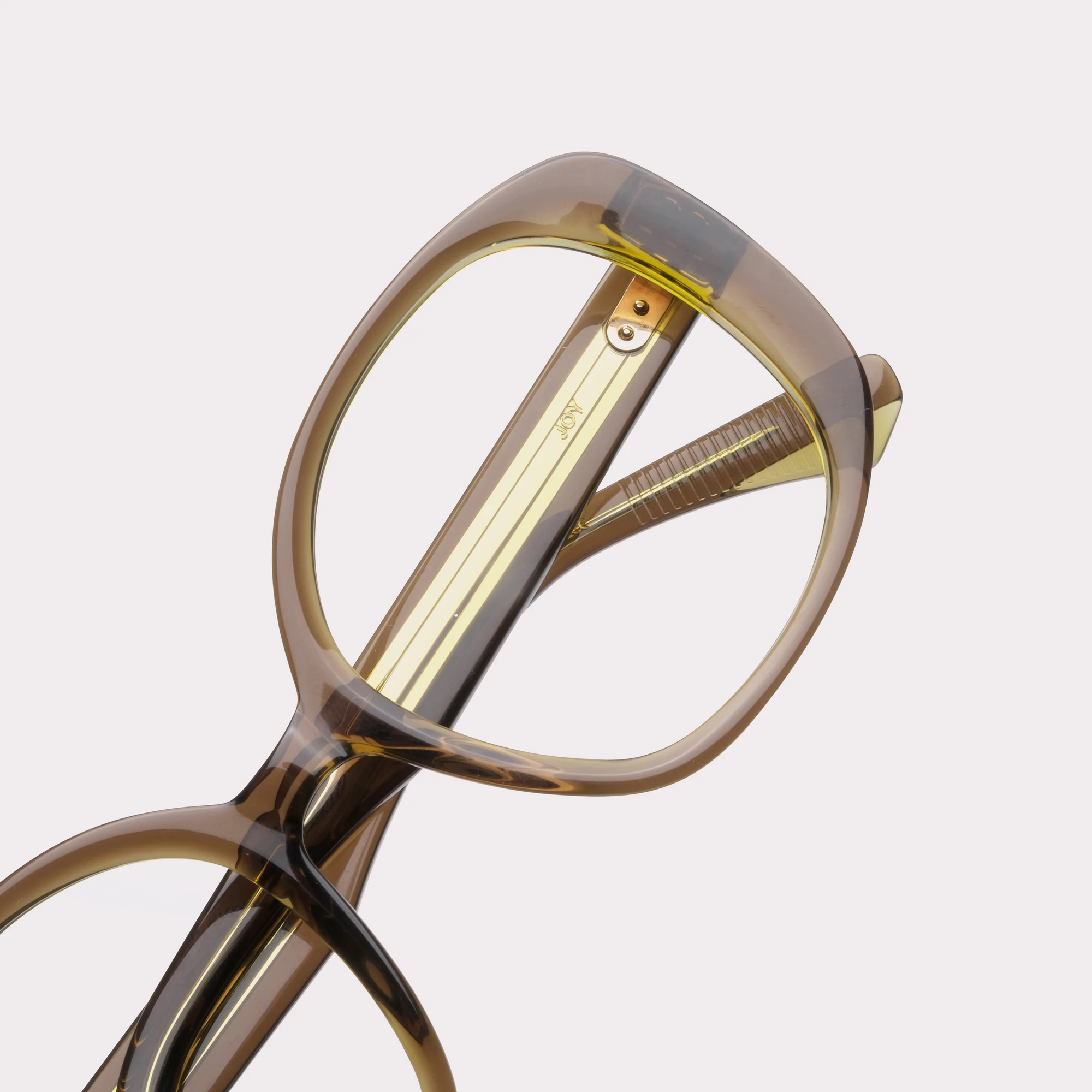 Ein Paar Joy Khaki Korrekturbrille in der Makroansicht