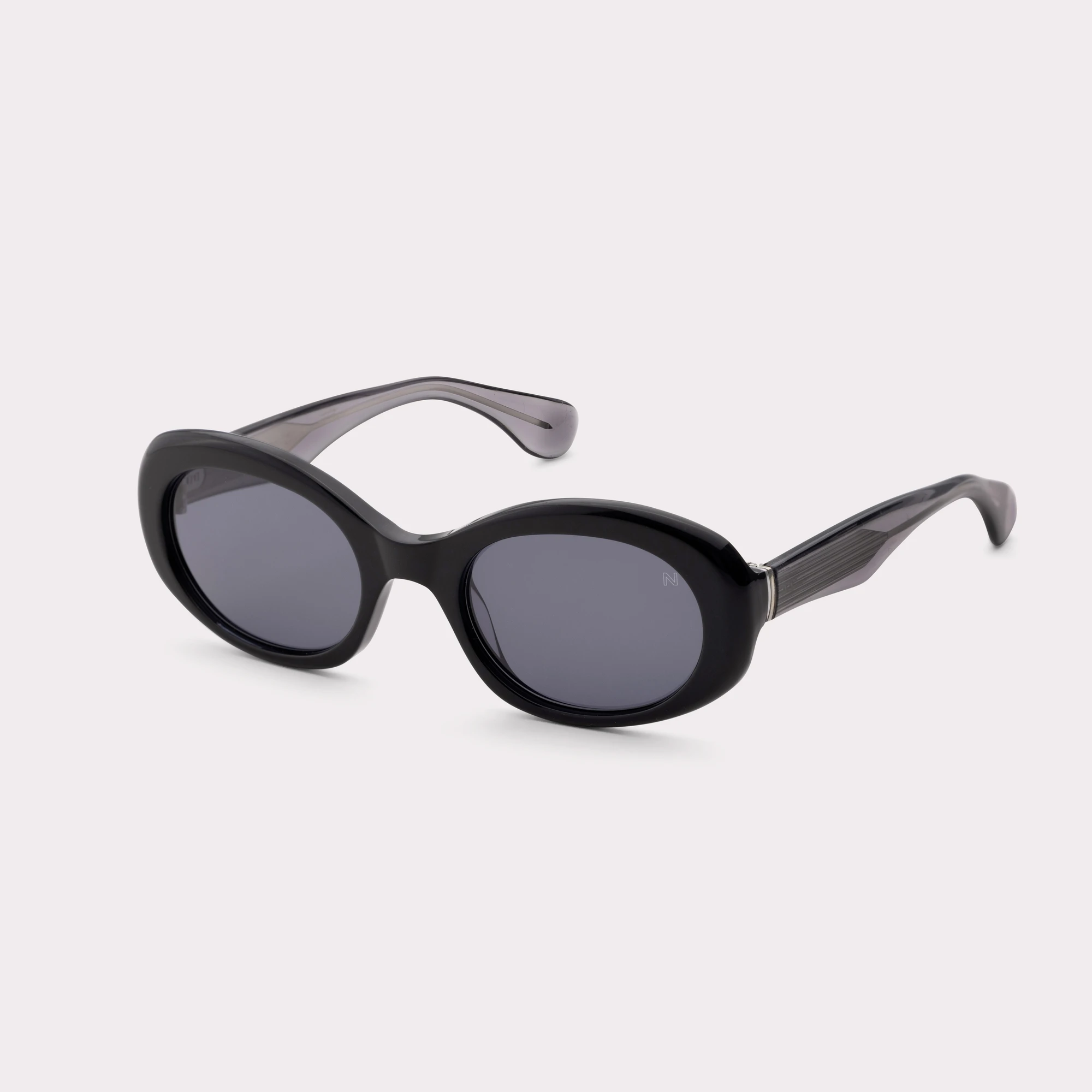 A pair of Loop Black Sunglasses  seen from the side