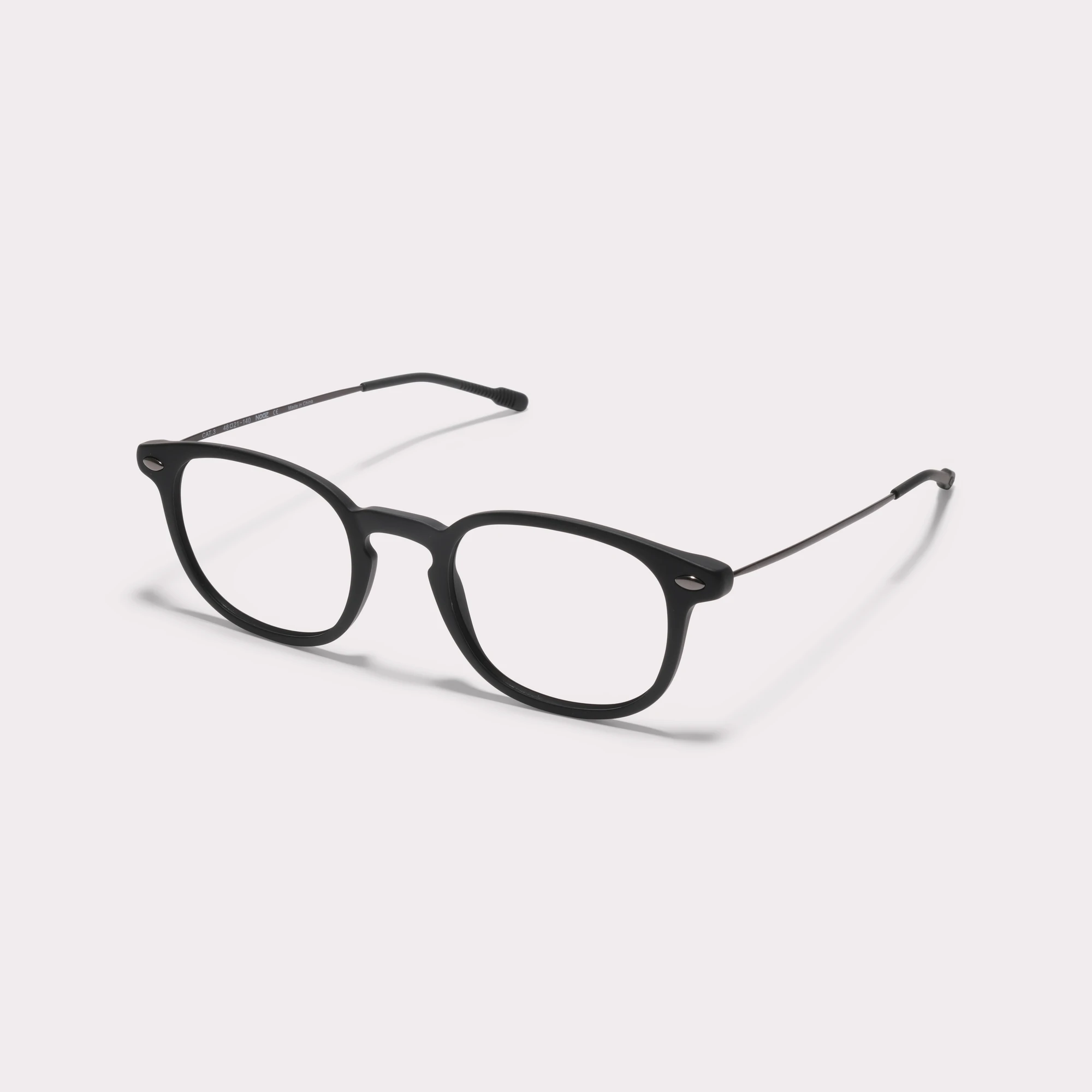 A pair of Alma Black Reading glasses  seen from the side