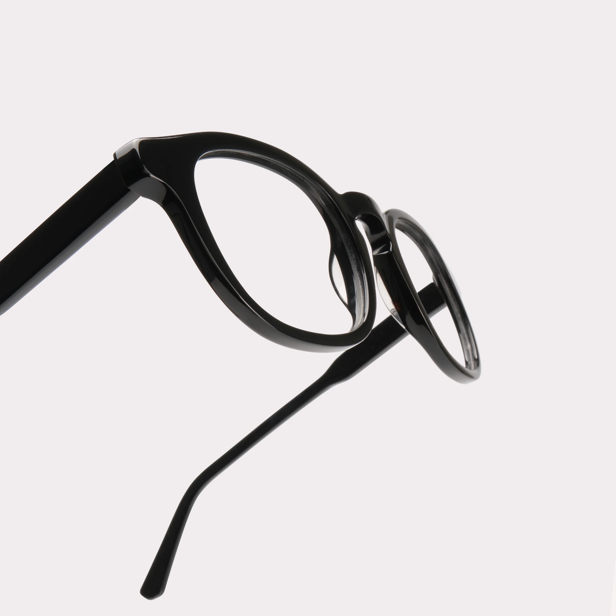 A pair of Loen Black Reading glasses in a macro view
