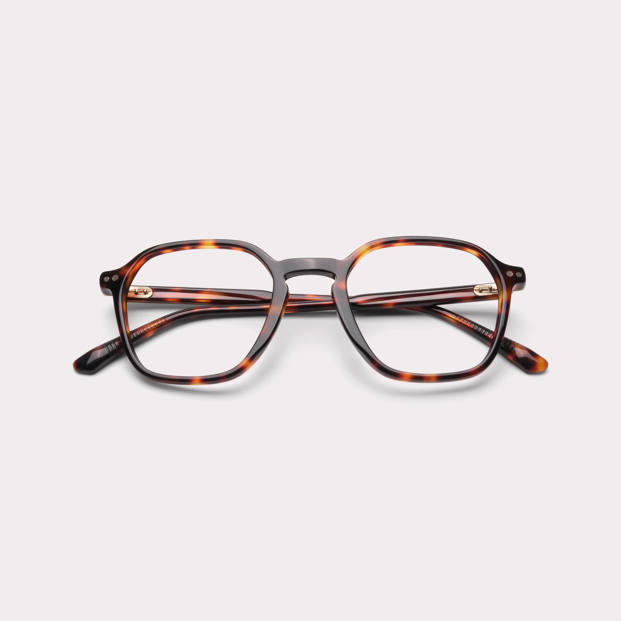 A pair of Aaron Tortoise Prescription glasses folded