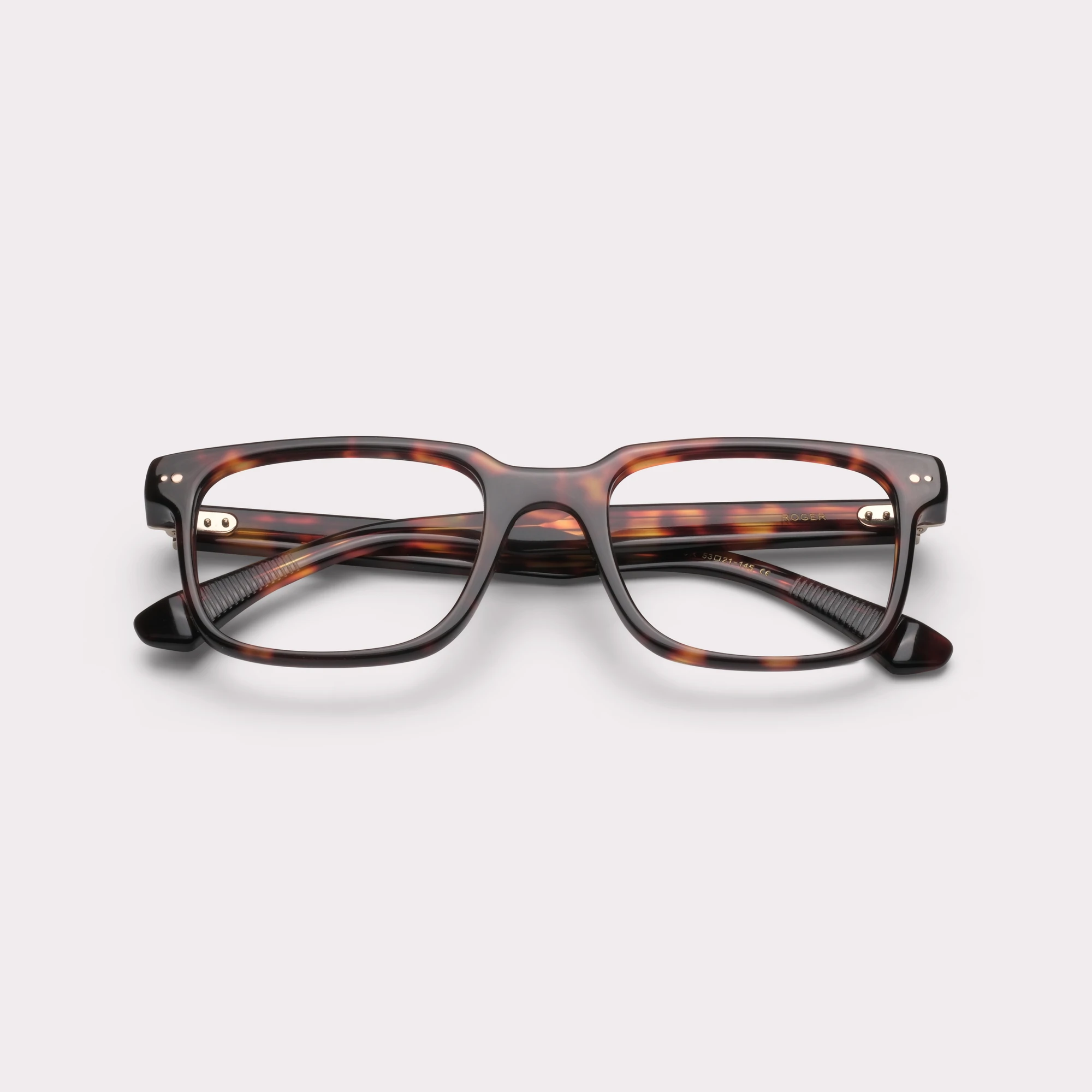 A pair of Roger Tortoise Prescription glasses folded