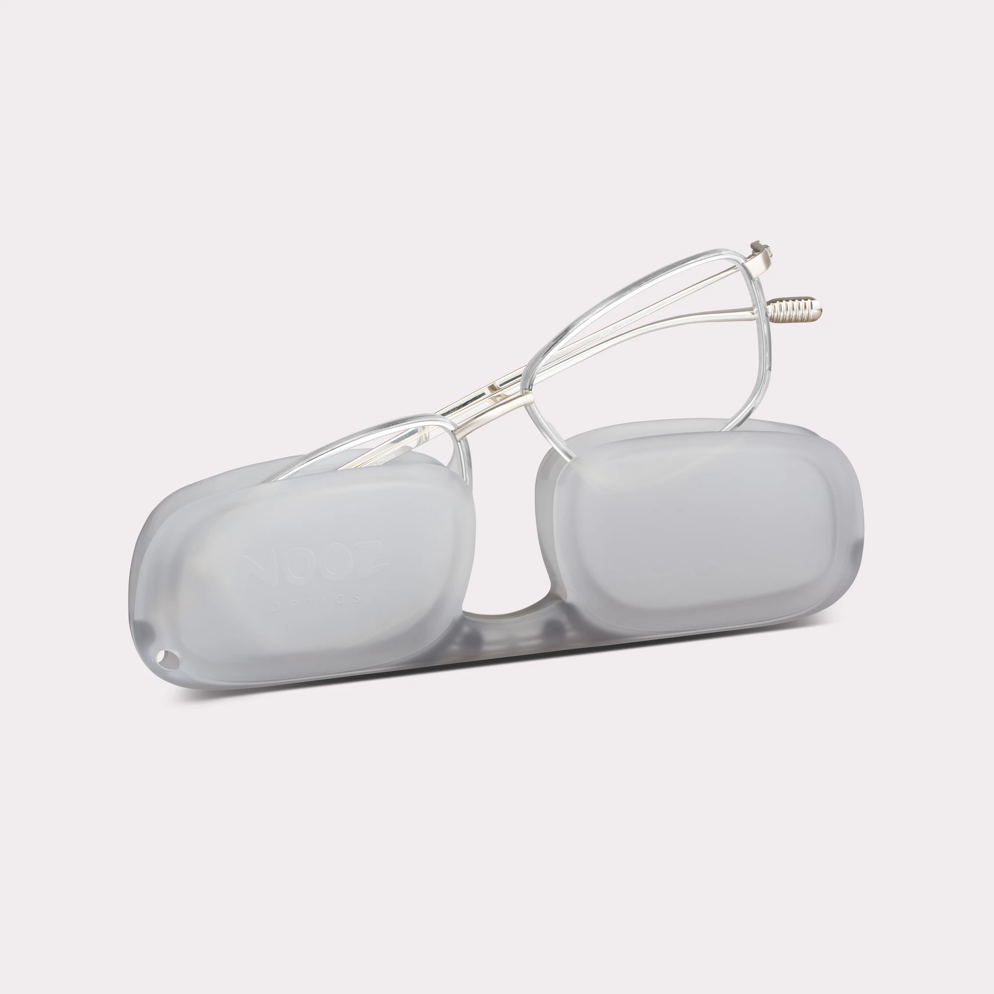 A pair of Faro Crystal Reading glasses coming out of its case