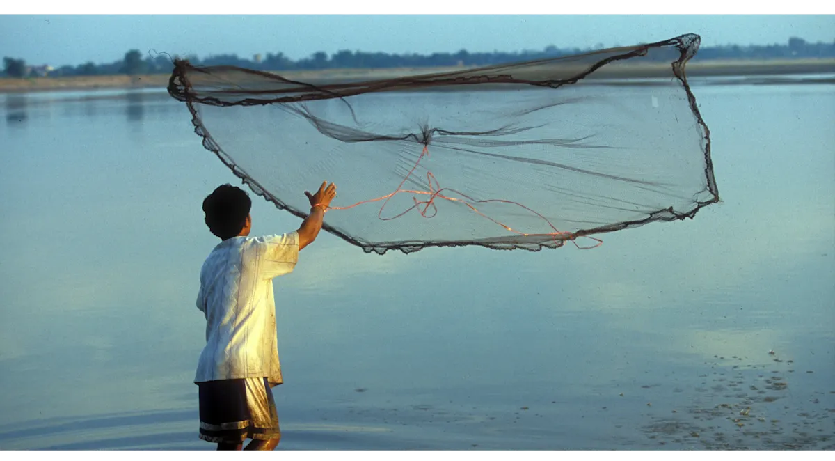2021 Fishing & Aquaculture images - boy throwing net