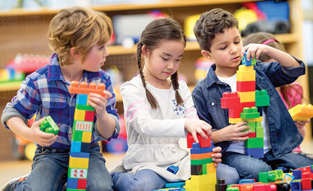 Young Kids Playing With Blocks
