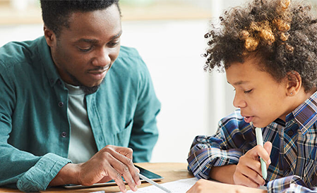 adult and child working together