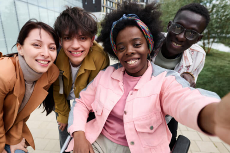 Four students taking a selfie.