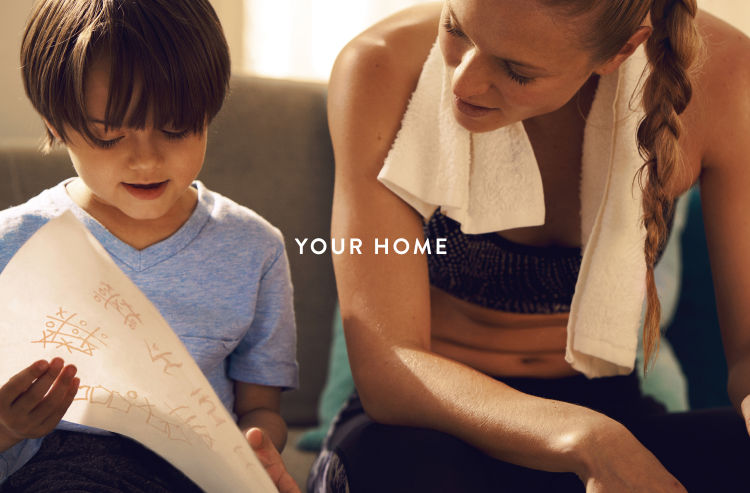 Peloton-Bike-Interactive-Classes-NYT-Print-Ad-Wrap-Mother-And-Child