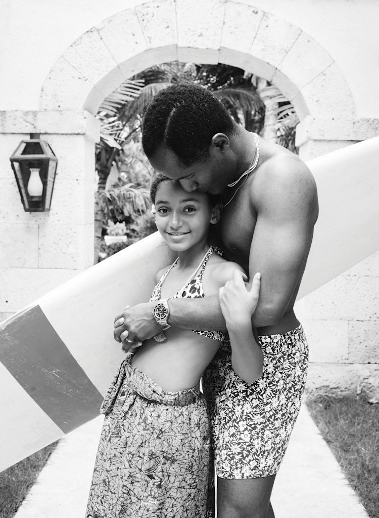 Inspirato-Black-And-White-Father-Daughter-Lifestyle-Photo-Surfing-Dominican-Republic-DR