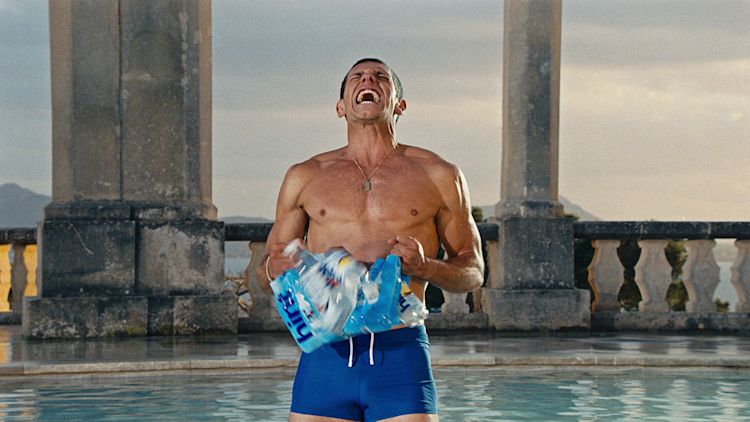 hint-mythology-advertising-marketing-design-mmmm-water-campaign-2026-60-second-seductive-campaign-film-man-tearing-up-the-water-bottle-shrink-packaging