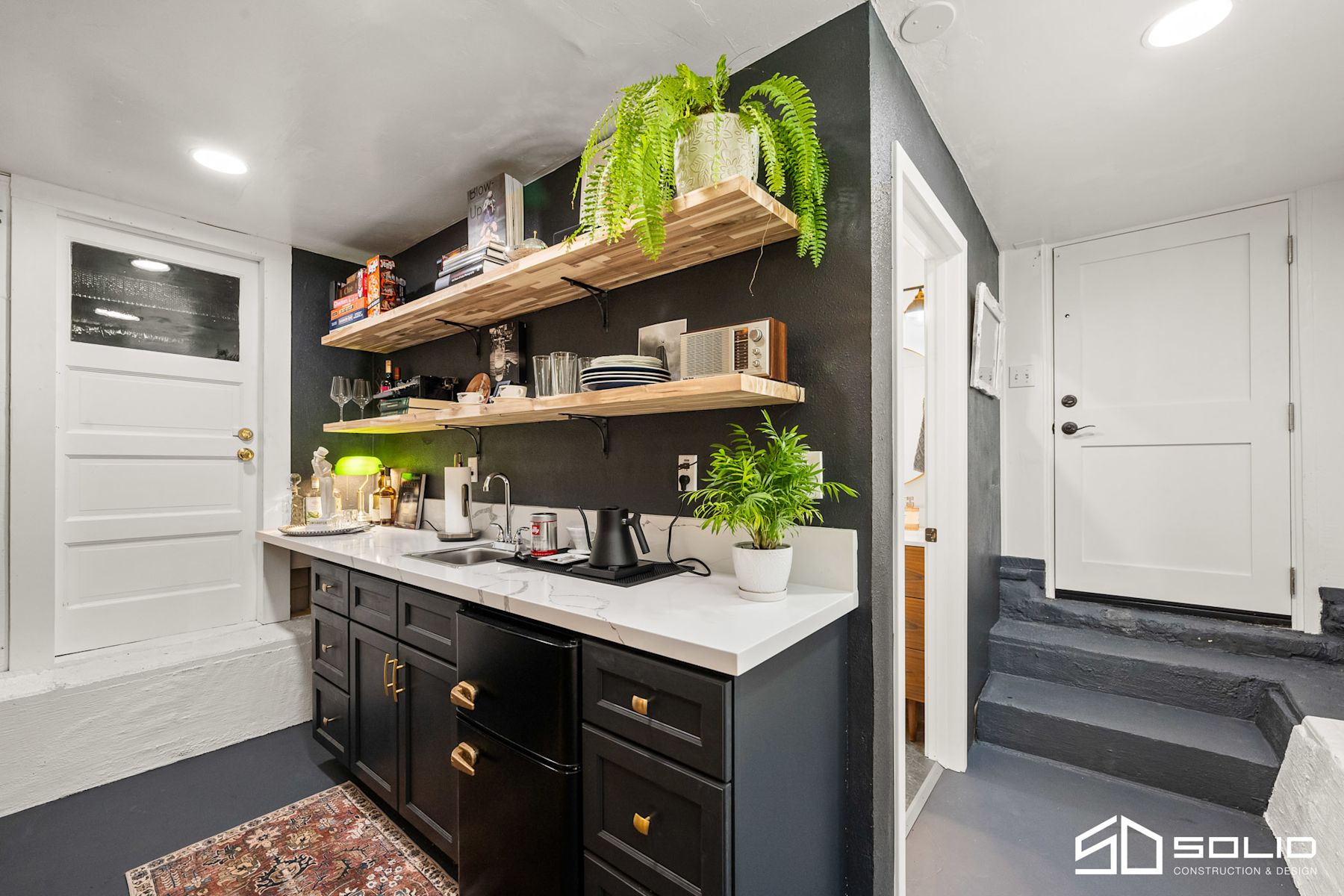 Garage Conversion: Custom Kitchenette and Bathroom Design