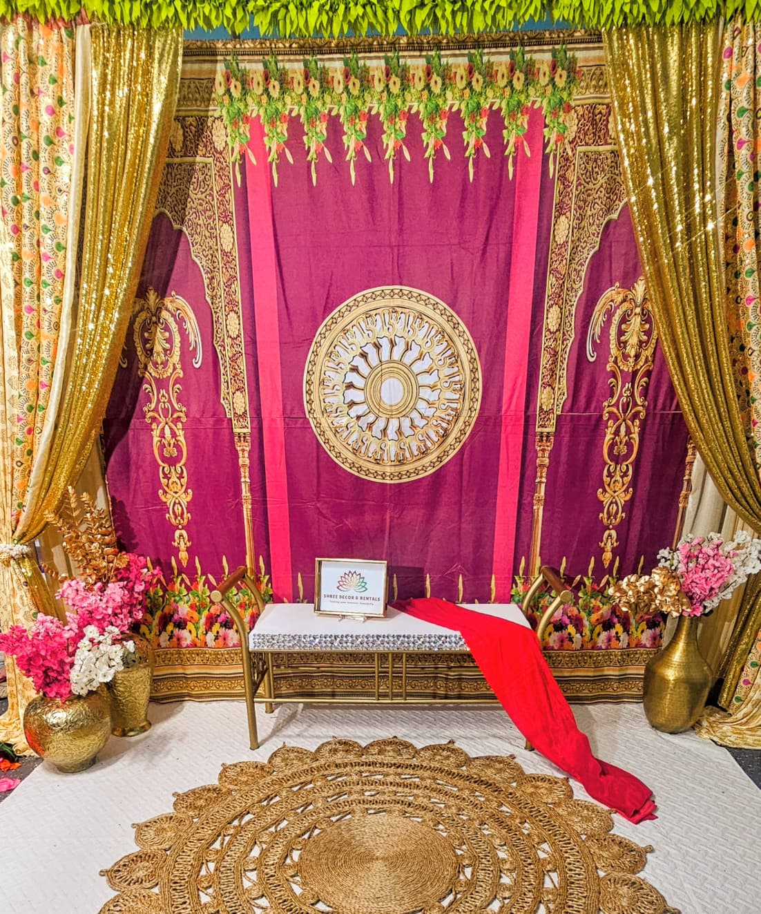 Royal Maroon and Gold Backdrop with Floral Accents