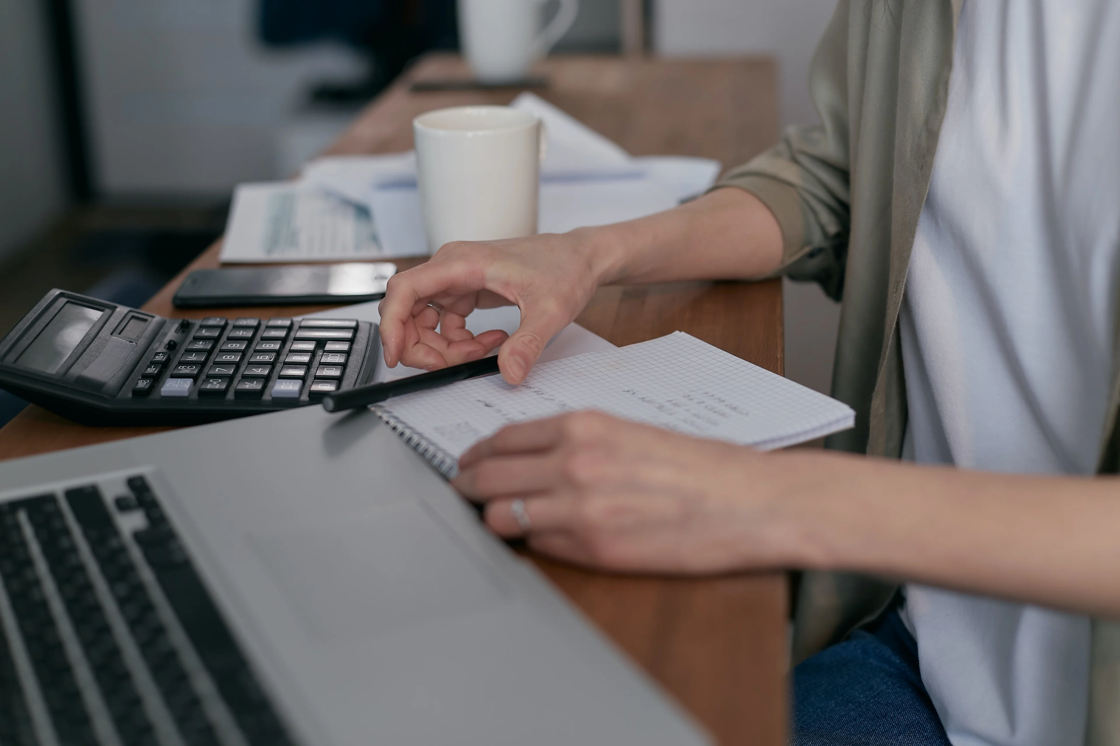 A woman preparing a debt reduction plan