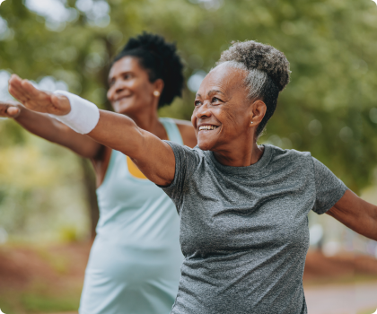 Two Senior black females exercising