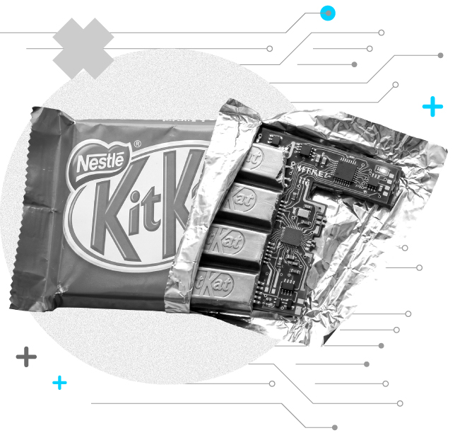 A collage illustration of a Kit Kat bar partially unwrapped, revealing computer circuit patterns on parts of the chocolate sticks. Abstract tech-themed graphics are in the background.