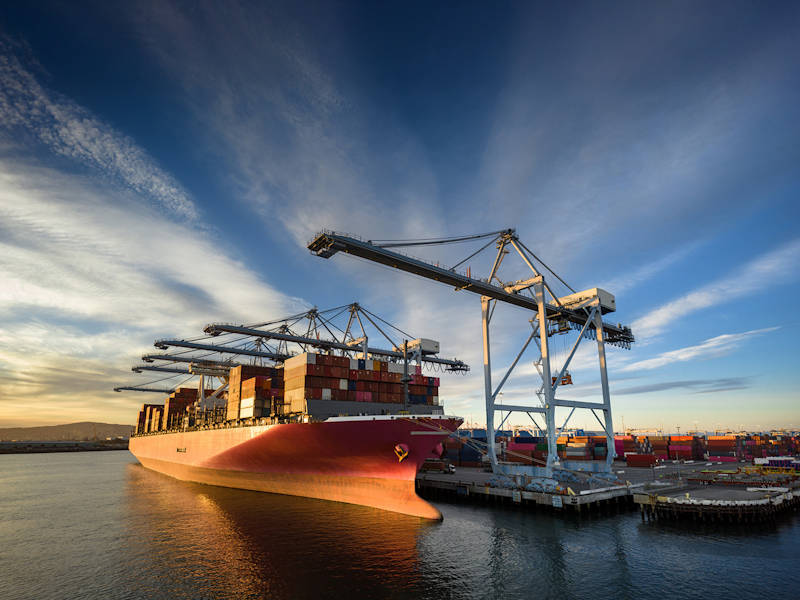 Cargo ship with containers in the port
