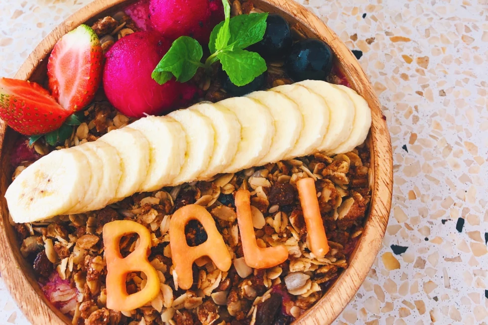 A fruit cereal bowl  with letters selling Bali. 