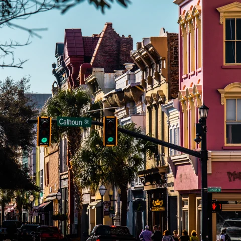 Street lined with colorful houses during daytime