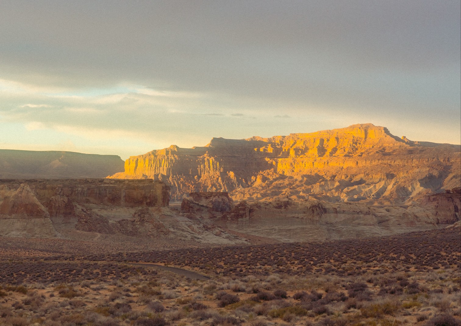 Desert and cliffs during sunset