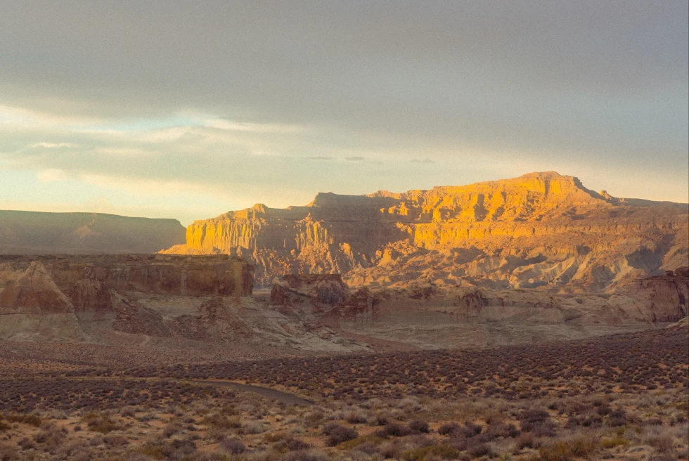 Desert and cliffs during sunset