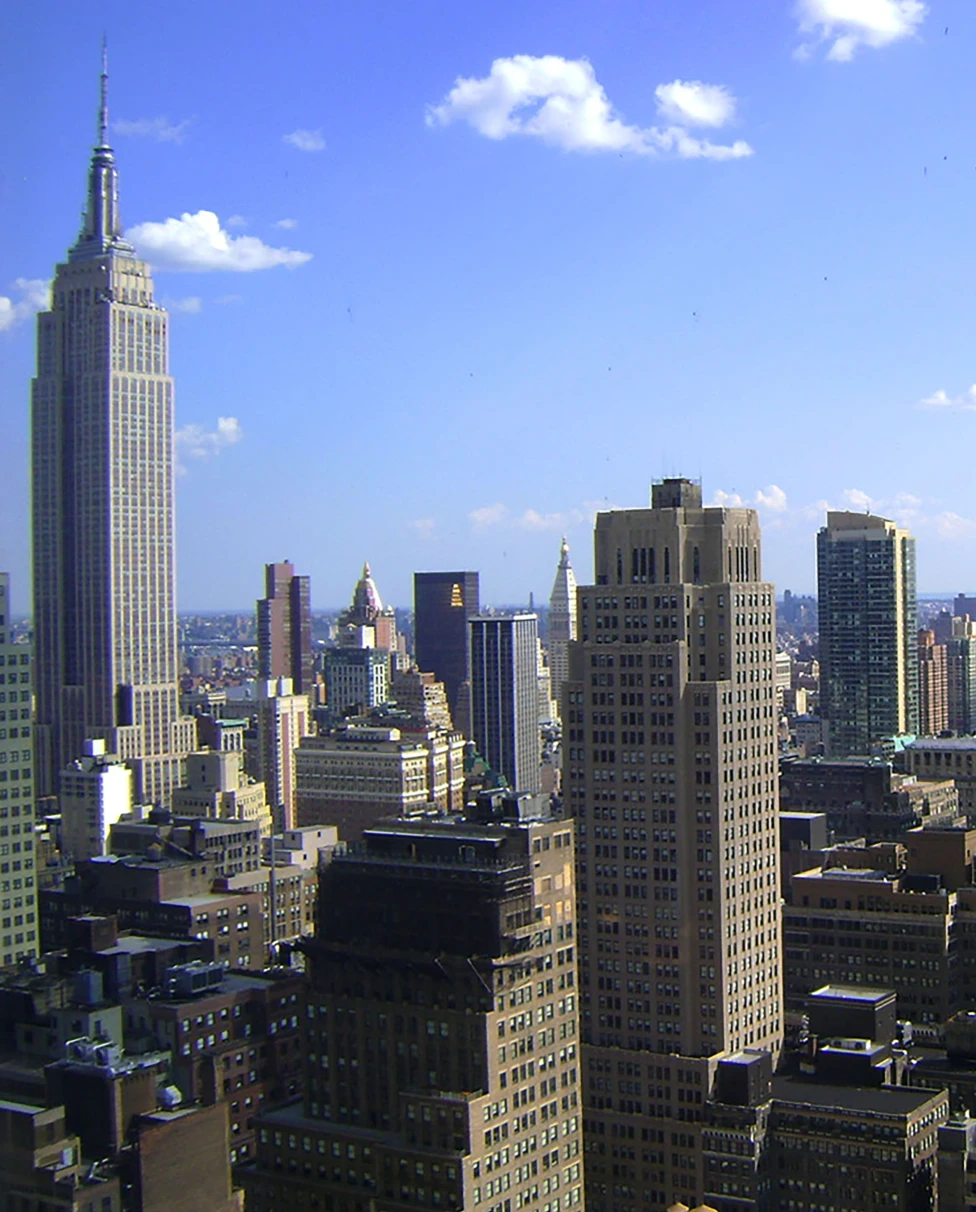 Standing tall among the buildings is the Manhattan Skyline.