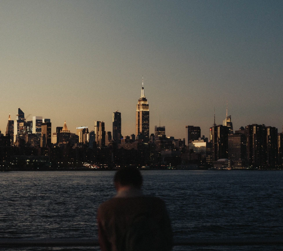Manhattan skyline shot at dusk from Brooklyn