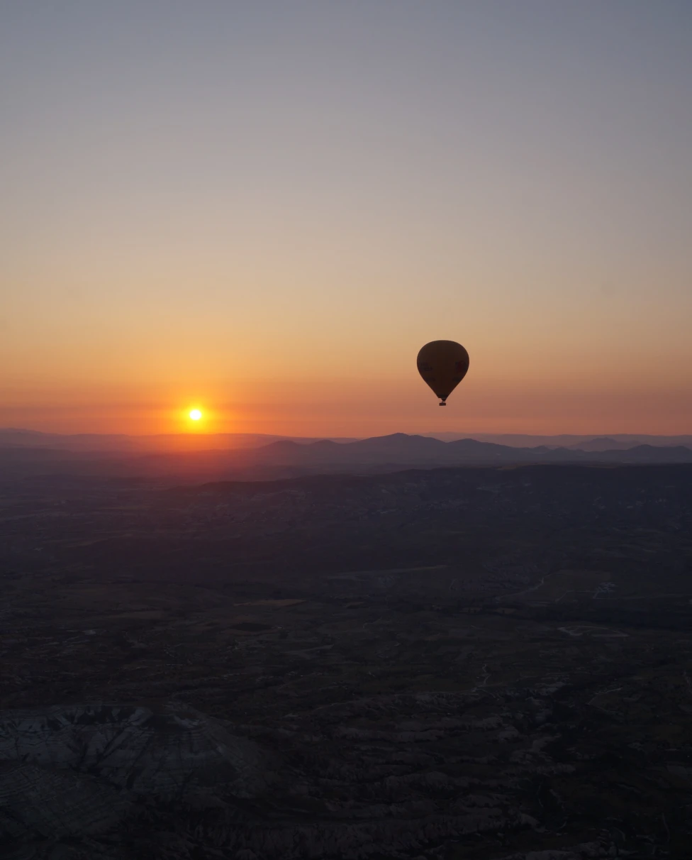 Hot air balloon in the sky during a sunset
