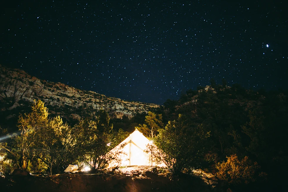 A tent in Colorado at night