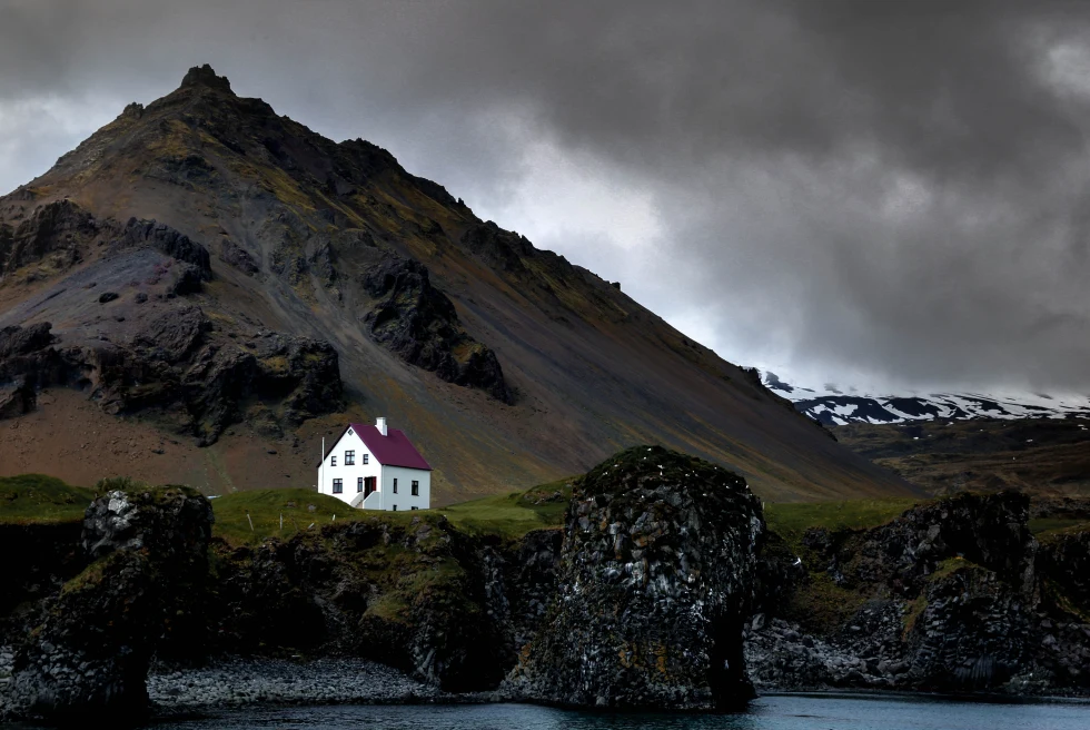 A small house in the middle of nowhere in Iceland.