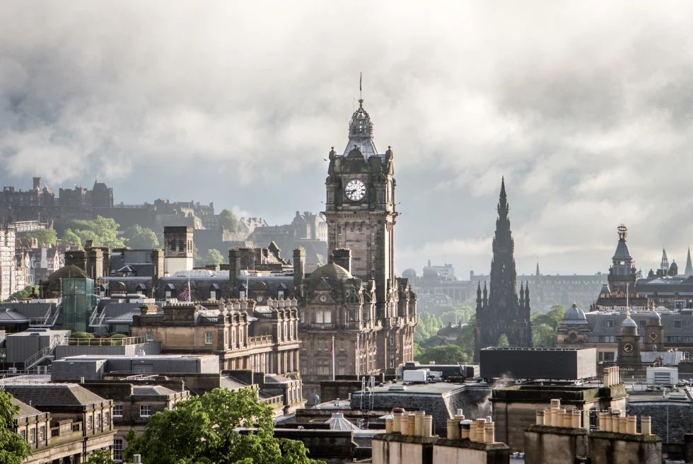 large buildings with cloudy skies