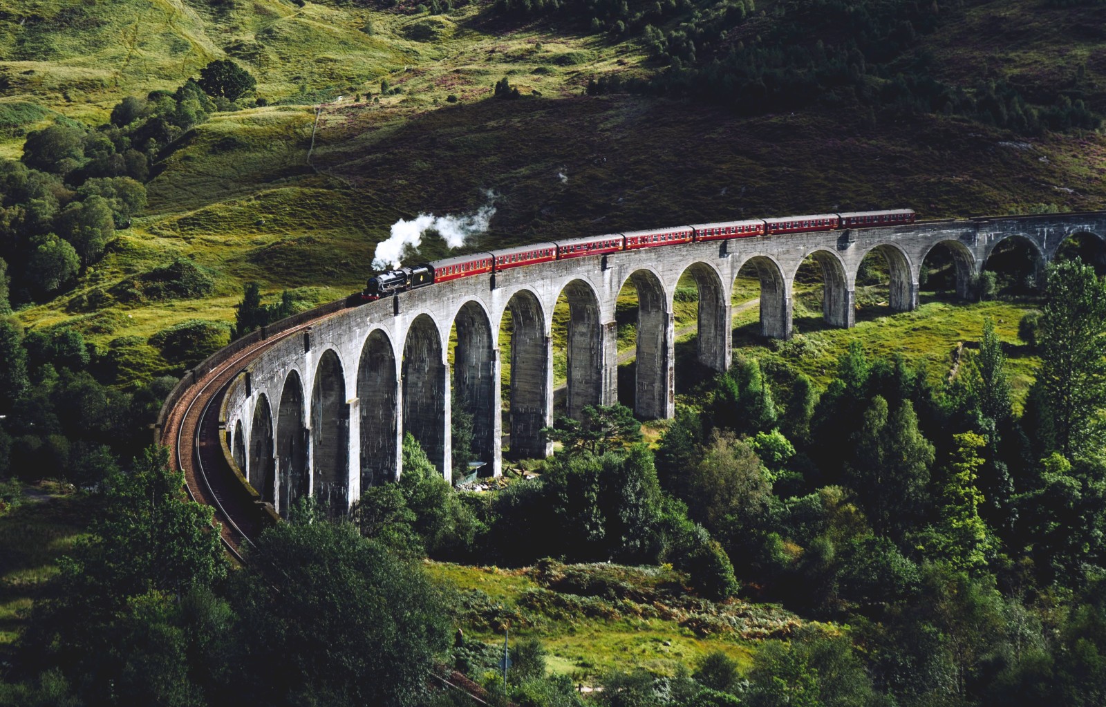 A train going over an aqueduct in Scotland. 