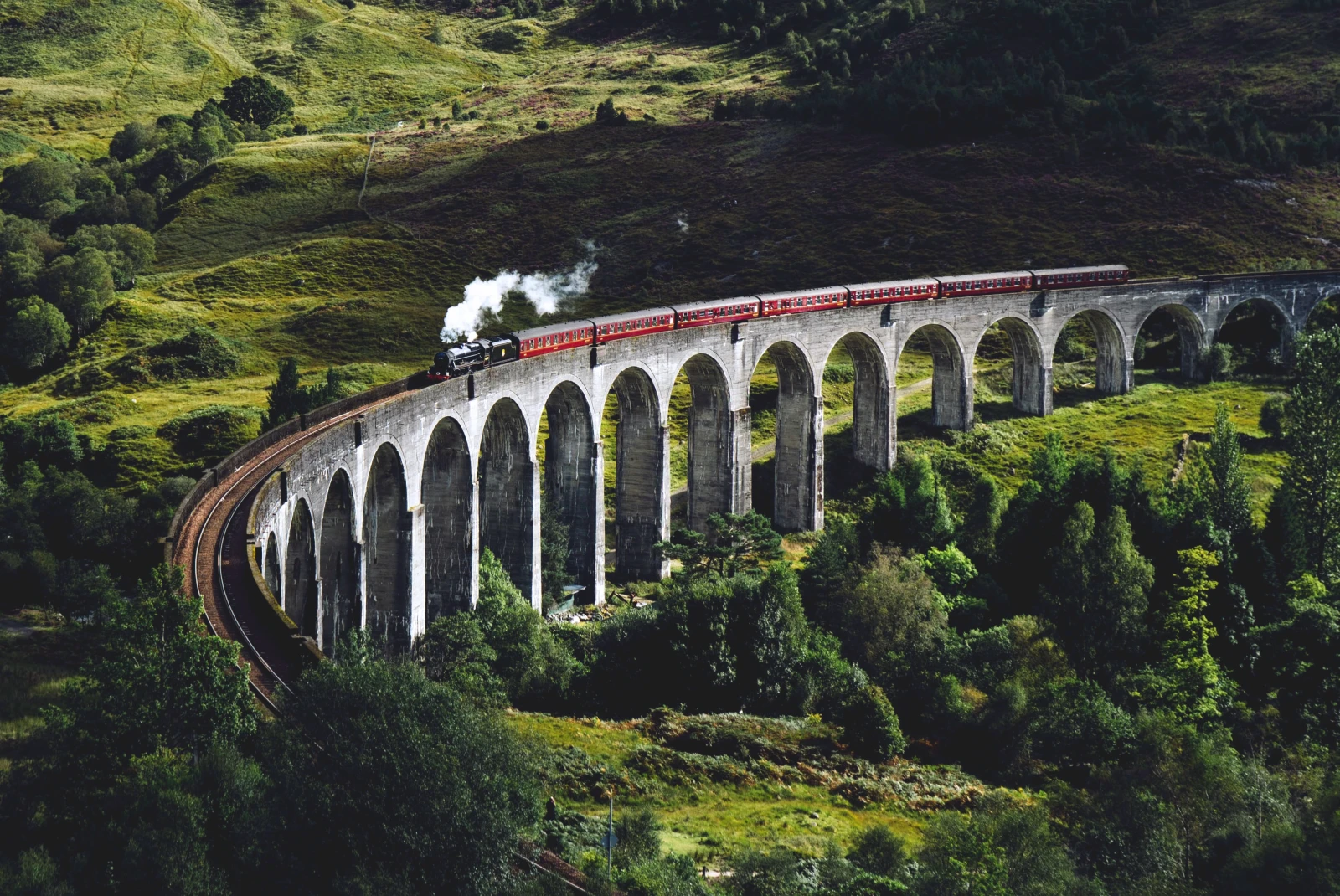 A train going over an aqueduct in Scotland. 
